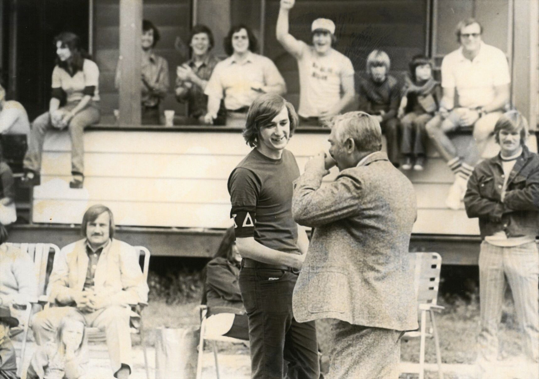 Congressman Silvio O. Conte grabs a drink at a NASC frat house.